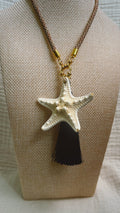White starfish pendant necklace with black silk tassel