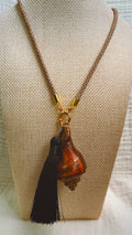 Dark espresso spiral shell necklace with black silk tassel