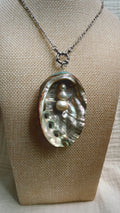Iridescent abalone shell necklace with pearls and metal fringe