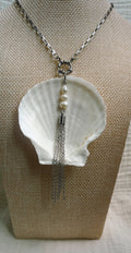 White scallop shell with pearls and silver metal chain fringe