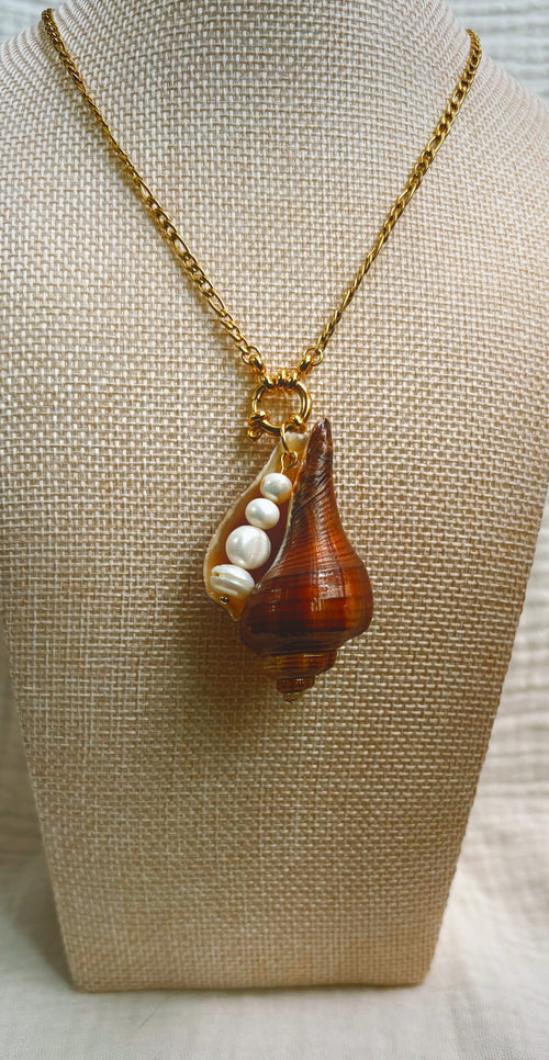 Dark brown shell with white pearls on gold-tone chain