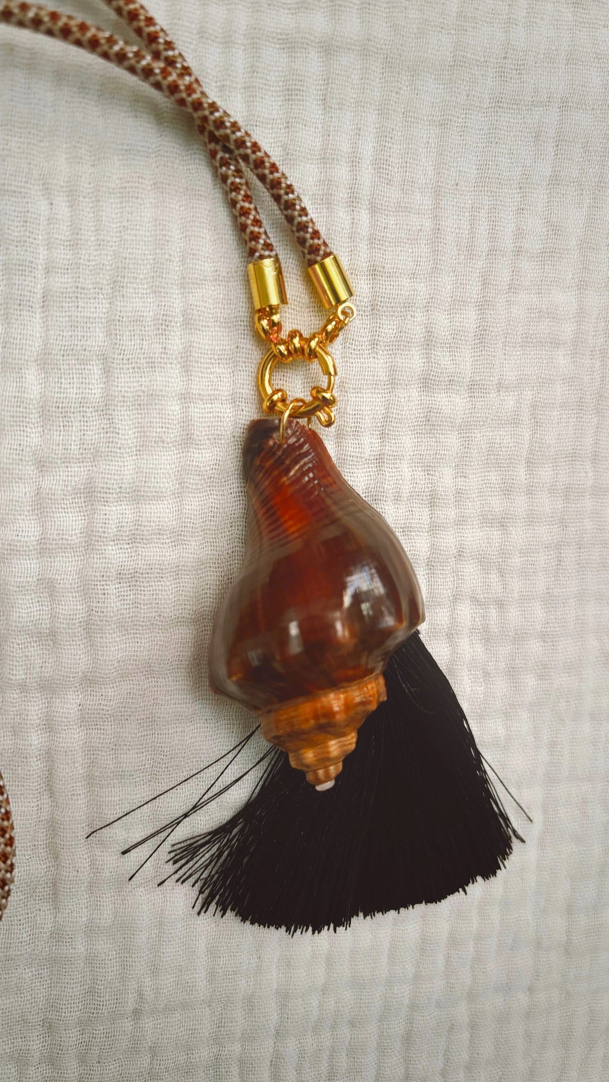 Dark espresso spiral shell necklace with black silk tassel