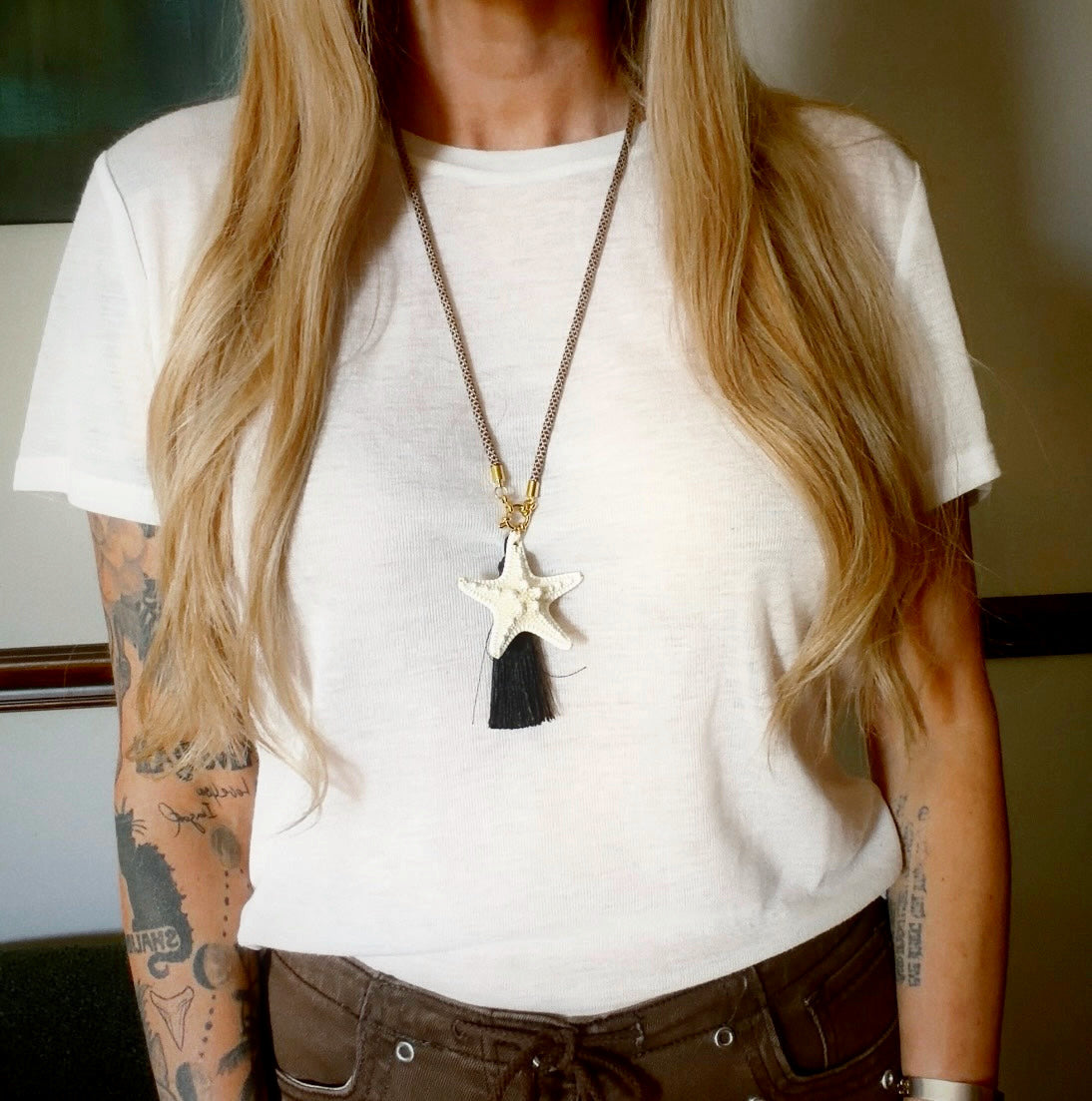 White starfish pendant necklace with black silk tassel