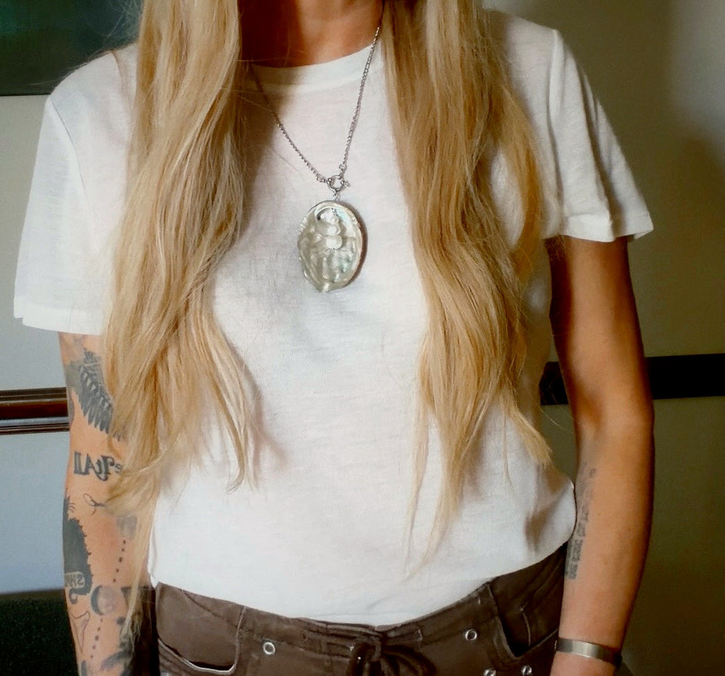 Iridescent abalone shell necklace with pearls and metal fringe