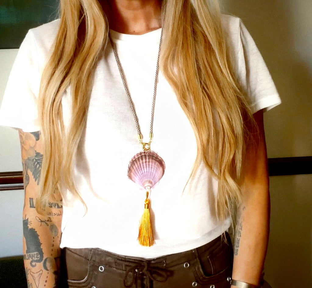 Mauve scallop shell necklace with copper silk tassel on patterned cord